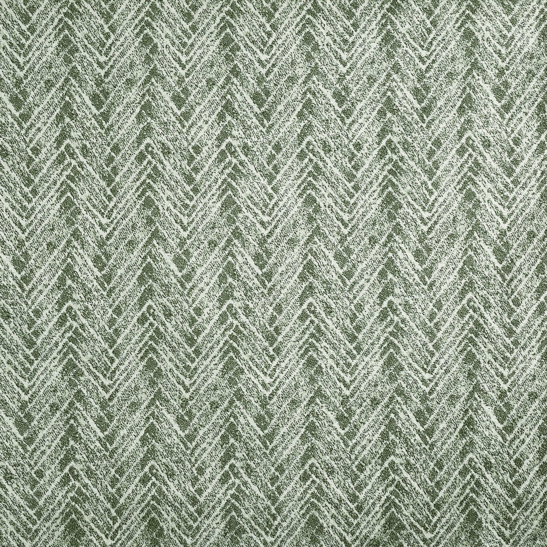 Close-up of sage green and cream patterned woven fabric from Prestigious Textiles